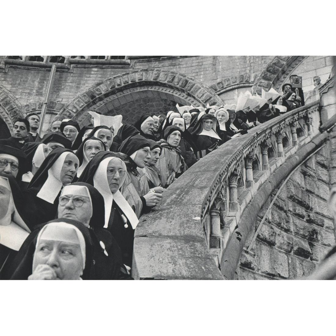 HENRI CARTIER-BRESSON - Lourdes, France - Nuns: Artist: HENRI CARTIER-BRESSON Print Title: Lourdes, France Medium: Sheet-fed Gravure Printing Date: 1960's Printed in Switzerland Image Size approx: 7.75 x 11.5 inches Henri Cartier-Bresson (1908-2004