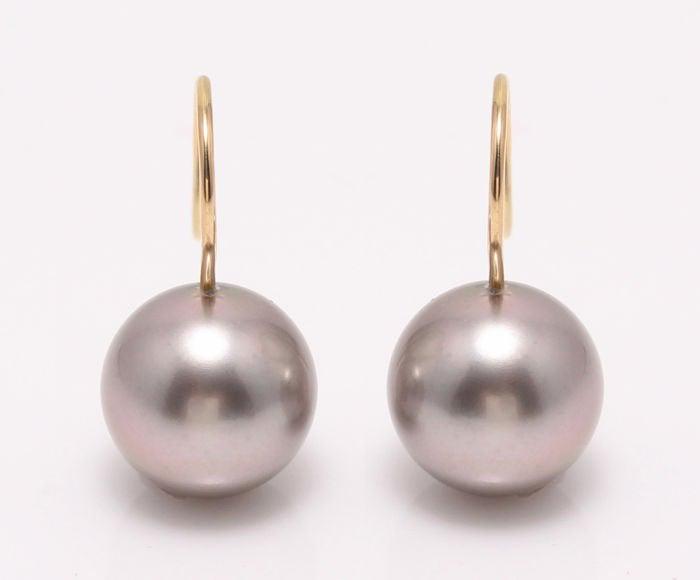 18 kt. Yellow Gold - 11x12mm Round Tahitian Pearls -: Emerging from the tropical lagoons of French Polynesia, these Tahitian pearls have been hand selected for their natural beautiful tahiti green colour and lustrous shine. They look beautiful with the y