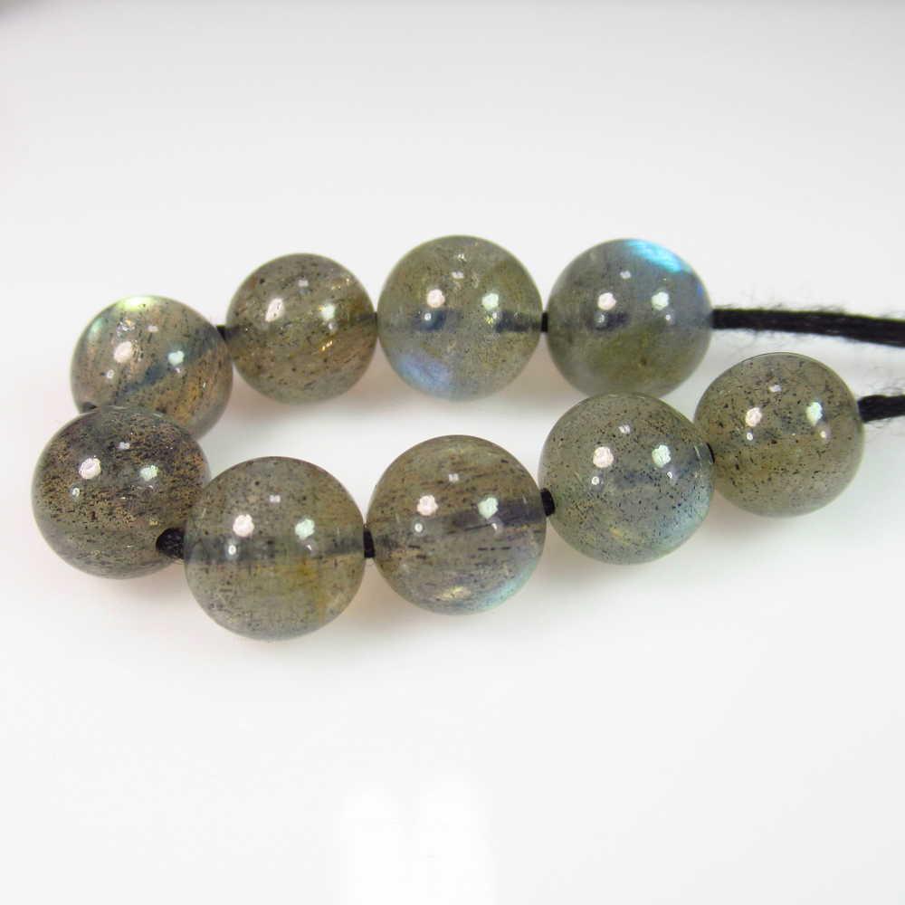 36.80 Ct Genuine 9 Labradorite Drilled Ball Beads: No Reserve! Title: 36.80 Ct Genuine 9 Labradorite Drilled Ball Beads Stone Clarity: Transparent Gemstones: Natural Labradorite Beads Carat Weights: 36.80 Size/Dimensions: 8.10 - 9.10 mm / 9 PC's Addit