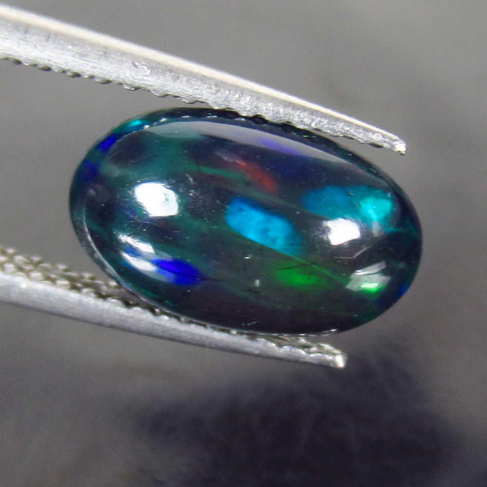 1.73 Ct Geuine Ethiopian Fire Black Opal Oval Cab (1 of 2)