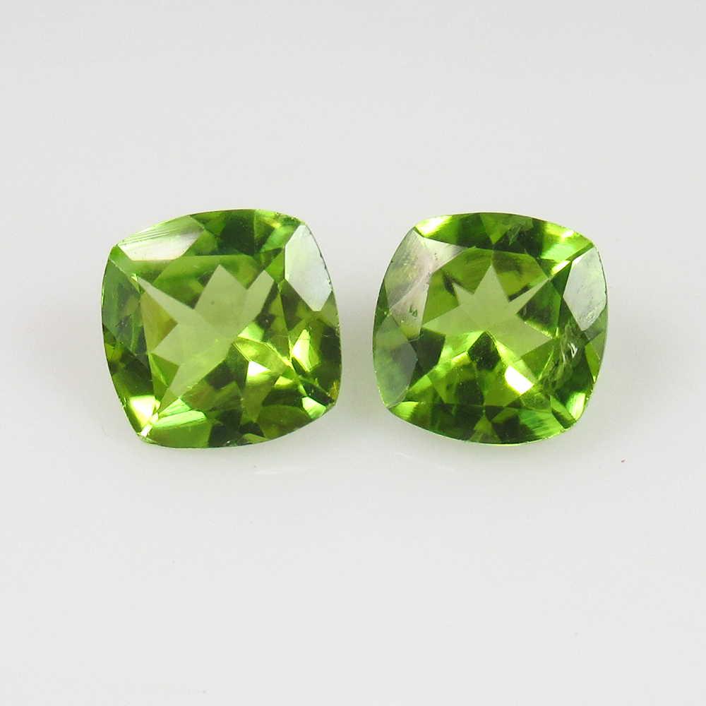 3.01 Ct Genuine Pakistan Peridot Cushion Pair: No Reserve! Title: 3.01 Ct Genuine Pakistan Peridot Cushion Pair Stone Clarity: VVS Gemstones: Natural Peridot Carat Weights: 3.01 Size/Dimensions: 7.00 x 7.00 x 4.00 mm / 2 PC's Additional Informatio