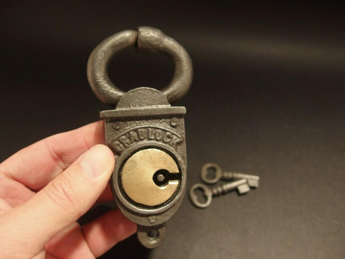 Wrought Iron Trunk Chest Box Crab Lock Key Padlock: 4 3/4" Long x 2 1/4" Wide Just wonderful heavy duty antique reproduction iron padlock with keys. Fully functional, looks great on an old truck or chest! Reserve: $15.00 Shipping: Domestic: Flat-rate o