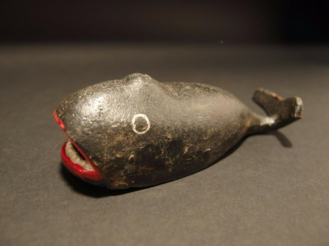 Cast Iron Whale Beer Soda Bottle Cap Opener: 5" Long x 1 3/4" Wide Great folk art cast iron bottle opener. This piece was hand painted and aged to look like an antique. Reserve: $10.00 Shipping: Domestic: Flat-rate of $10.00$ to anywhere within 