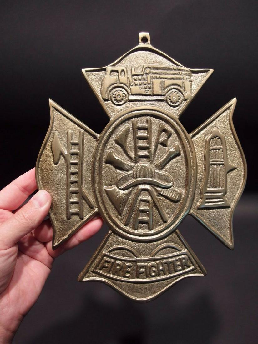 Brass Fire Fighter Plaque Fire Mark Sign: 10 1/4" Tall x 8" Wide Well made reproduction cast brass Fire Fighter plaque. Be sure to see the pictures.. looks old but is actually fairly new.. Reserve: $18.00 Shipping: Domestic: Flat-rate of $12.