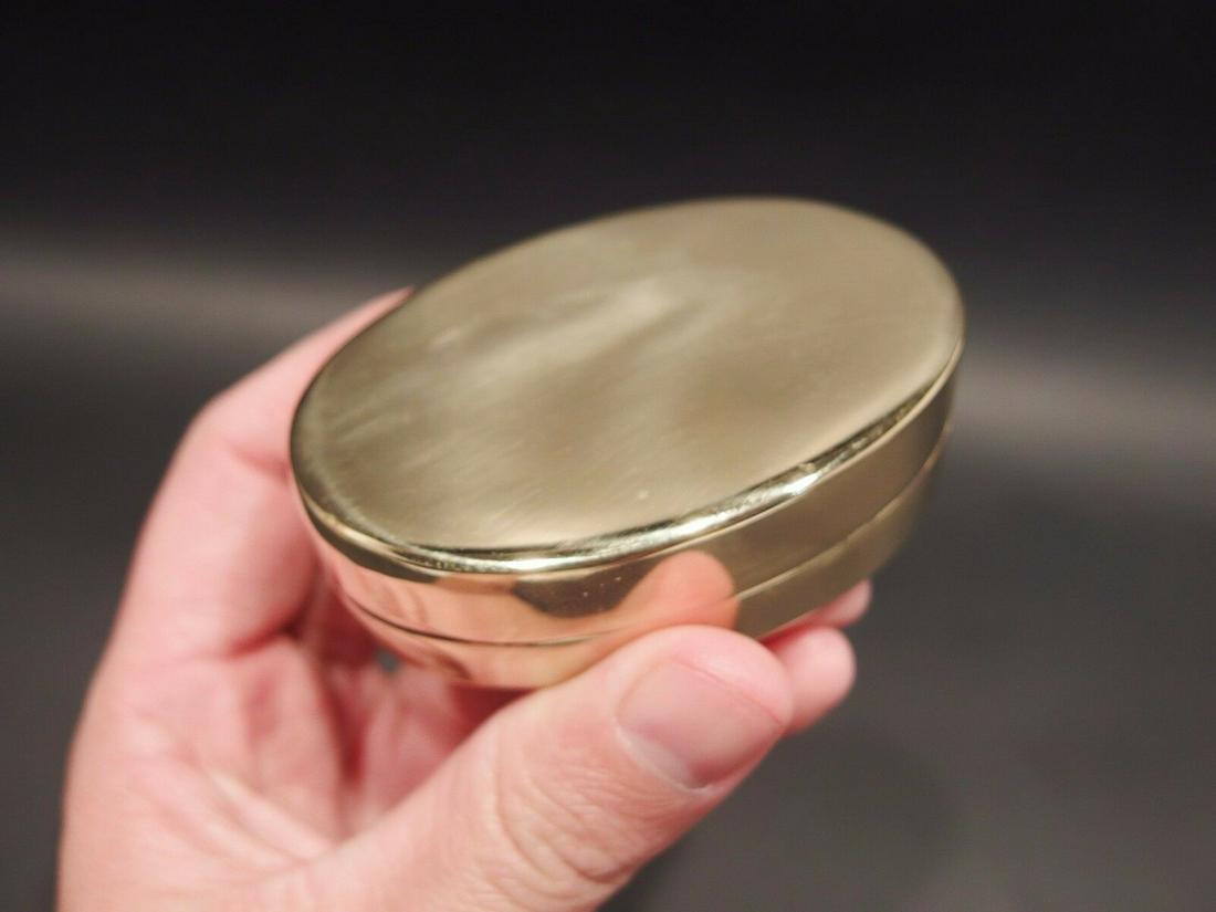 Brass Tobacco Snuff or Pill Box Ring Container Box: 2 7/8" long x 2" x 1 1/8" thick Nice reproduction of an antique brass container, well made with a snug fitting top... Small containers like this many times were used to store pills or snuff throughout