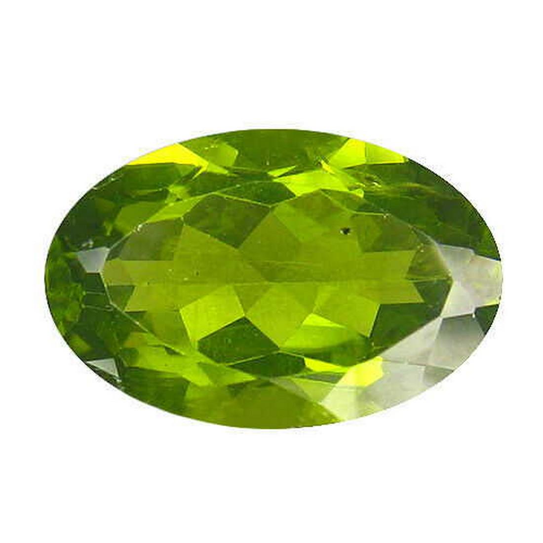 7.77 ct natural green peridot from Pakistan: Title: 7.77 ct natural green peridot from Pakistan Color/Clarity: green/VS-SI Gemstone Type: natural/heated Carat Weights: 7.77 Size/Dimensions: 15.42 X 10.06 X 6.66 MM Origin: Pakistan Reserve: $75.0