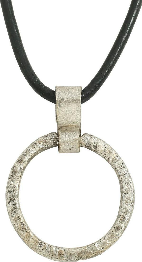 VIKING PROTECTIVE BROOCH 900-1050 AD: Circular bronze, just over 7/8” diameter with nubbed or roped surface in the full round. Surface lightly textured from burial. Worn in numbers on the surface of the jerkin, these small metal brooche