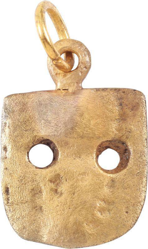 MEDIEVAL EUROPEAN PENDANT 12th-15th CENTURY: Gilt bronze. Shield shaped with small finial to the bottom Over 1” height. Worn as part of the elaborate trappings for man and horse in tournament and war. Professionally refurbished with the gold o
