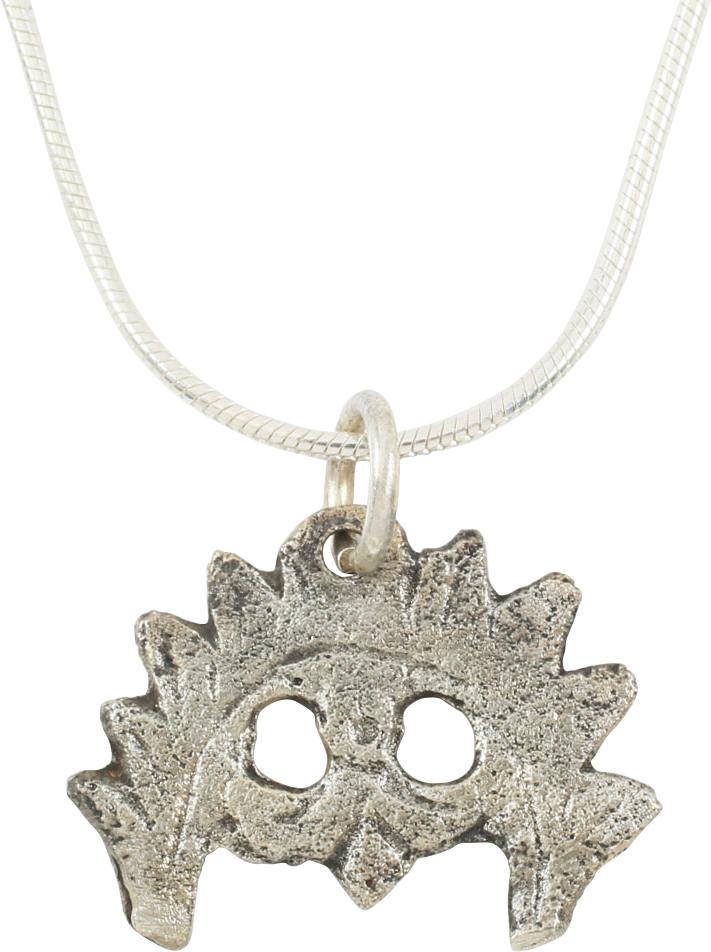 VIKING LUNAR PENDANT 9TH-10TH CENTURY AD: Bronze, cast and intricately hand detailed, the crescent moon with hound’s tooth crest, enclosing a trefoil. Probably signifying a solar eclipse. Vikings were skilled seamen with great reliance on t