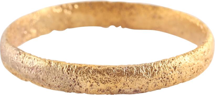 ANCIENT VIKING MAN’S WEDDING RING C.850-1050 AD: Gilt bronze. 3.1mm width, Rounded face band, large size 10 1/2. A light texture from burial. Vikings exchanged rings on the pommel of the groom’s sword. Professionally refurbished with the 24k gold 