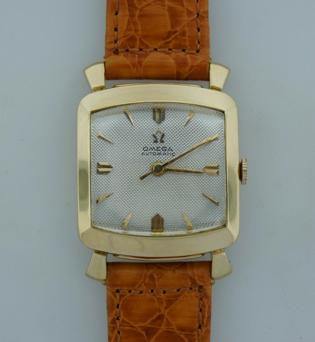 Vintage OMEGA 14k YELLOW GOLD WATCH w LIGHT BROWN STRAP: V IOO Classy Vintage c.1960Â’s Omega 14k Yellow Gold Watch OMEGA is one of the most well-known and recognized watches in the world. BRITAIN'S ROYAL FLYING CORPS chose Omega watches in 1917 as their