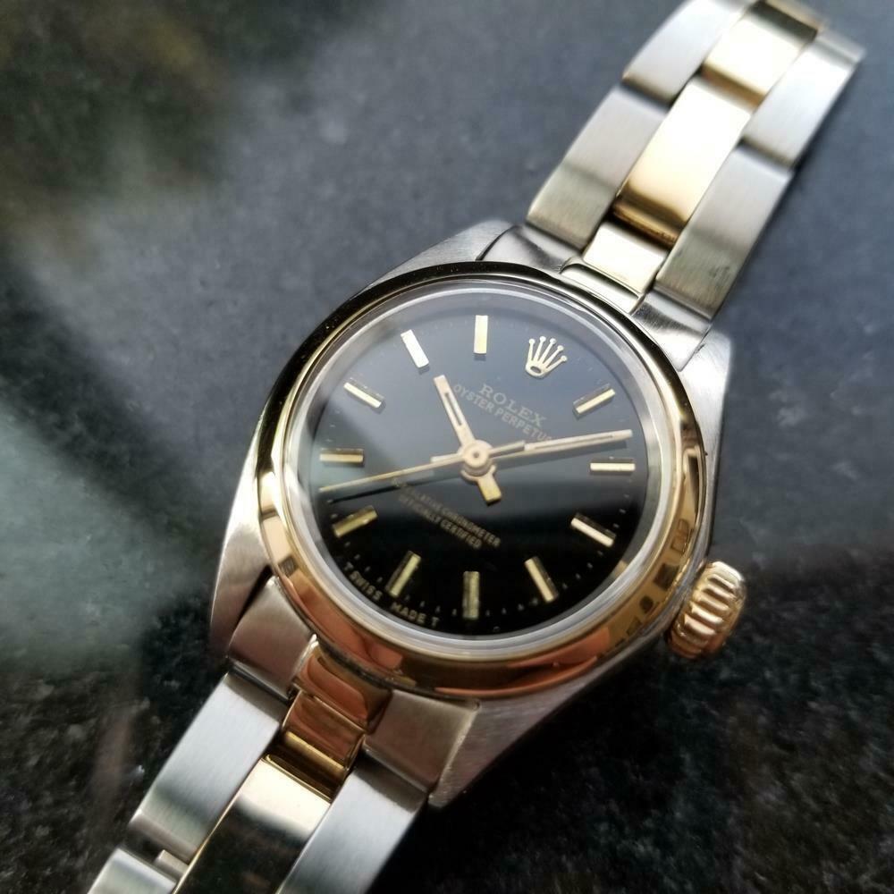 ROLEX 18k & ss Ladies Oyster Perpetual 6719 Automatic,: Timeless luxury, 18k and ss Rolex ladies Oyster Perpetual 6719 automatic, circa 1976, all original. Verified authentic by a master watchmaker. Stunning black Rolex dial perfectly accented with gold in