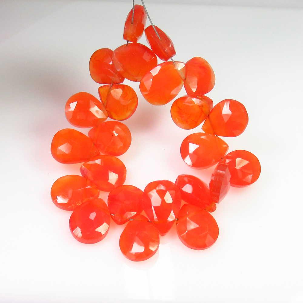57.85 Ct Genuine 23 Orange Carnelian Drilled Pear Beads: No Reserve! Title: 57.85 Ct Genuine 23 Orange Carnelian Drilled Pear Beads Stone Clarity: Transparent Gemstones: Natural Carnelian Beads Carat Weights: 57.85 Size/Dimensions: 9.8x8.4 - 11.4x8.4 mm / 2