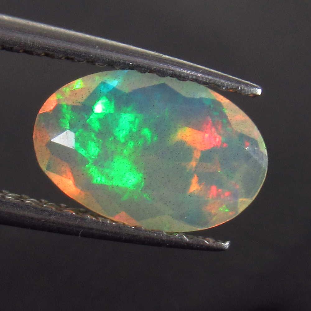 0.81 Ct Genuine Multi-Color Fire Faceted Opal Oval Cut (1 of 2)