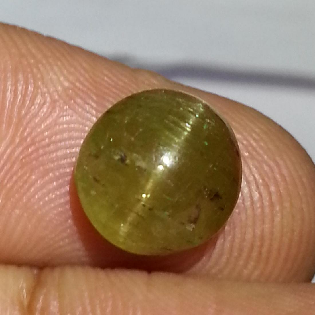 4.68 ct Natural Apatite cat's Eye: No Reserve! Title: 4.68 ct Natural Apatite cat's Eye Color/Clarity: Semi Transparent Gemstones: Loosegemstone Carat Weights: 4.68 Size/Dimensions: 9.30 x 9.30 x 6.30 Round - Jharkhand Shipping: Worldw