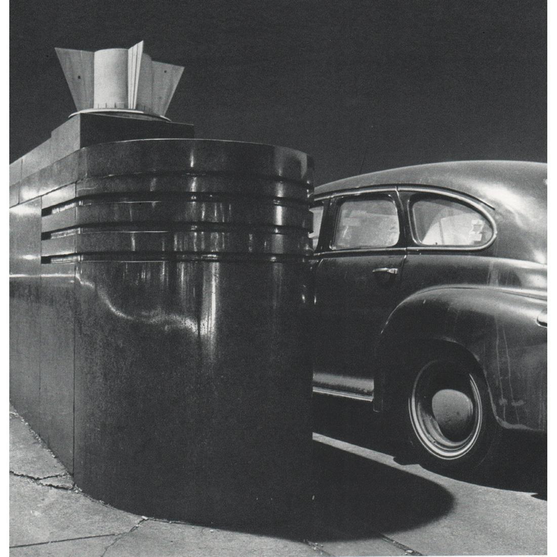 WAYNE SORCE - Untitled, 1940's auto, Chicago: Artist: WAYNE SORCE Print Title: Untitled, Chicago Medium: Sheet-Fed Gravure Printed in 1970's Printed in France Image Size: 8.5 x 7 inches Wayne Source (1946-2015) explored the urban landscapes of Ne