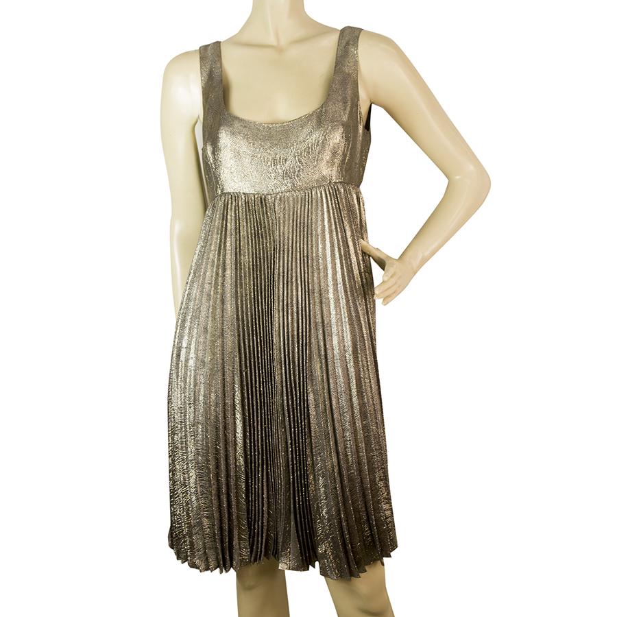 DKNY Donna Karan Golden Metallic Shine Sleeveless: This DKNY dress is a shiny party dress that can be worn in a club or an evening out with friends and make you feel wonderful capturing all eyes!! It features beautiful tank sleeveless style with pleat