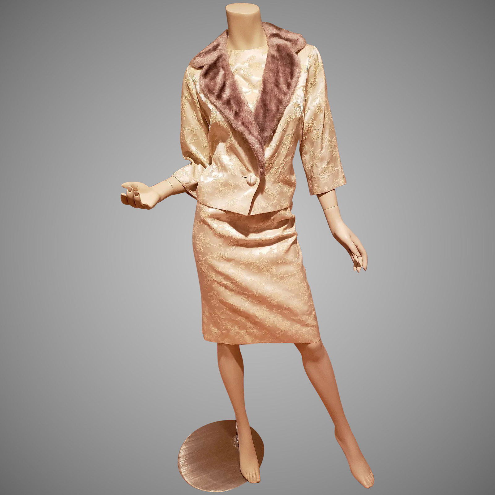 Carol Craig 1950's brocade Cocktail dress w/matching: Fabulous champagne colored sleeveless wiggle dress metal zip darts & fitted waist Matching Jacket with faux fur. In very good vintage condition Vintage label says 16 but it is more a medium Bust=-38-3