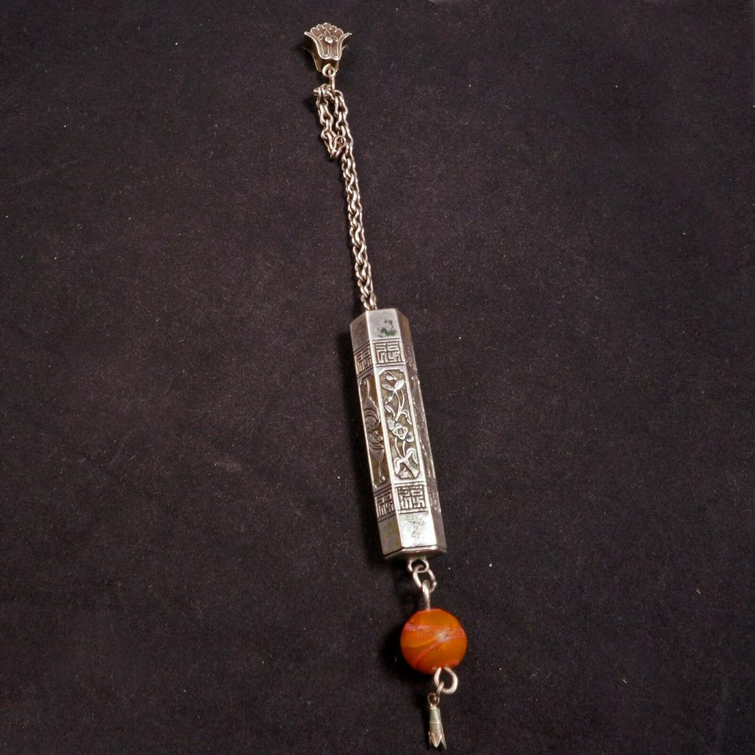 Chinese Paktong Needle Case Circa 1900: Shiny six-sided needle case that was not only useful but also beautiful. The Chinese made the ordinary and mundane a work of art. Six-sided outer case with alternating panels of a bat and a flower fra
