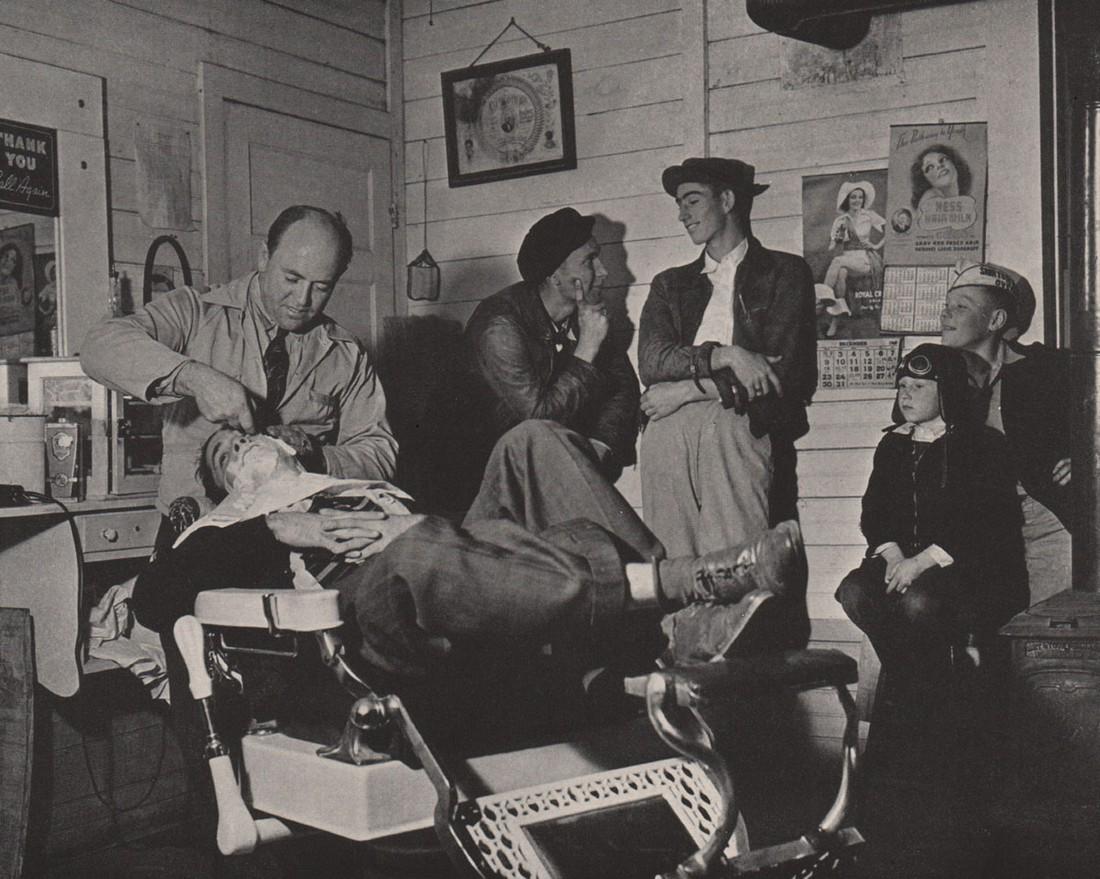 MARGARET BOURKE WHITE - Soso, MS, Barbershop: Artist: MARGARET BOURKE WHITE Print Title: Soso, MS, Barbershop Printing Date: 1940’s Medium: Photoengraving Printed in: the US Image Size: 11 x 8” Reserve: $25.00 Shipping: Domestic: Flat rate of