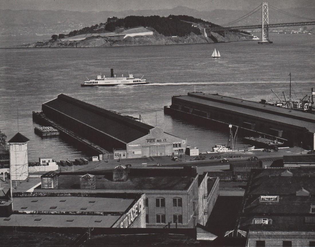 EDWARD WESTON- Embarcadero, San Francisco: Artist: EDWARD WESTON Print Title: Embarcadero, San Francisco Medium: Photoengraving Printed in USA in 1940’s Image Size approx: 7 x 9” Edward Weston 1886-1958) was a 20th-century American photogr