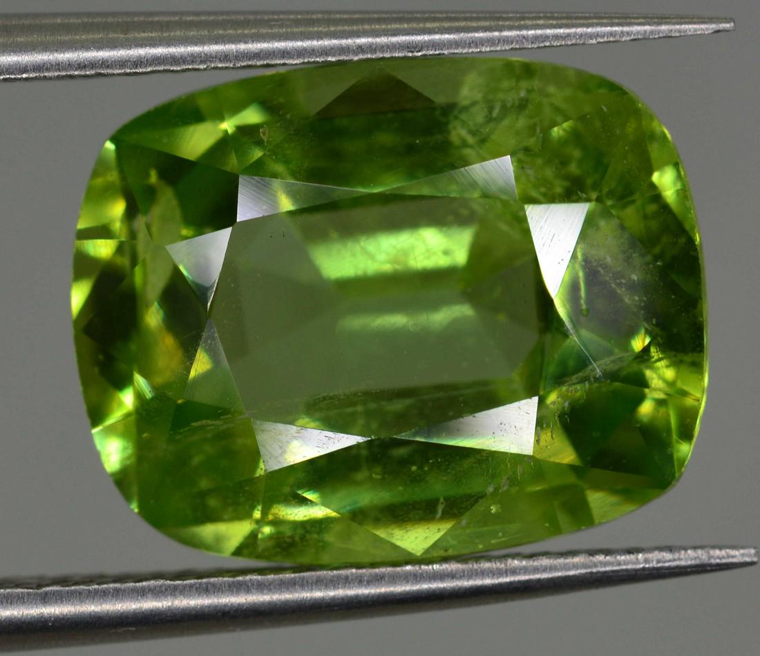 5 Carats Cushion Cut Peridot ~ 12x9x6 MM: Title: 5 Carats Cushion Cut Peridot ~ 12x9x6 MM Origin: Pakistan Gemstones: Peridot Carat Weights: 5 Carats Size/Dimensions: 12x9x6 MM Additional Information: Natural Reserve: $36.00 Shipping: Do