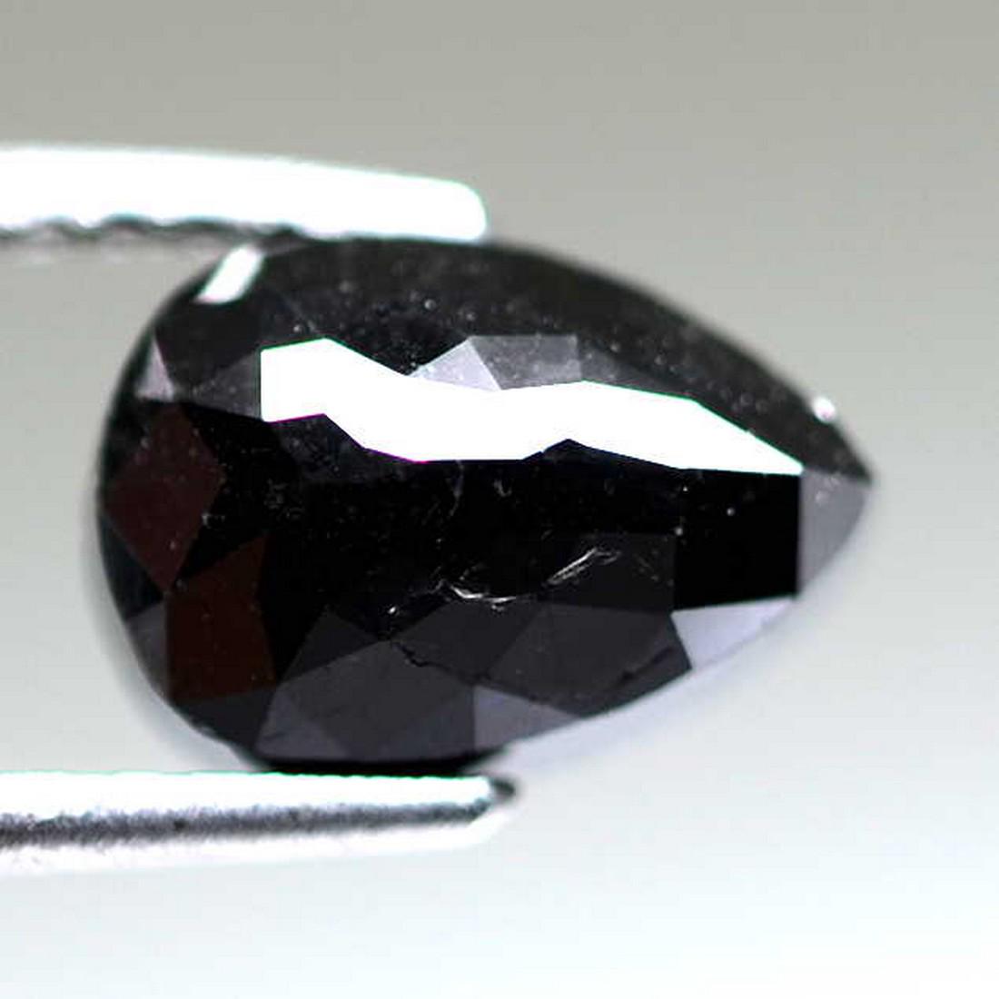3.82 Cts Natural Black Diamond: Title: 3.82 Cts Natural Black Diamond Color/Clarity: Black/Vs Gemstone Type: Diamond Carat Weights: 3.82 Cts Size/Dimensions: 10.70 x 7.47 x 5.10 mm Reserve: $80.00 Shipping: Domestic: Flat-rate of $