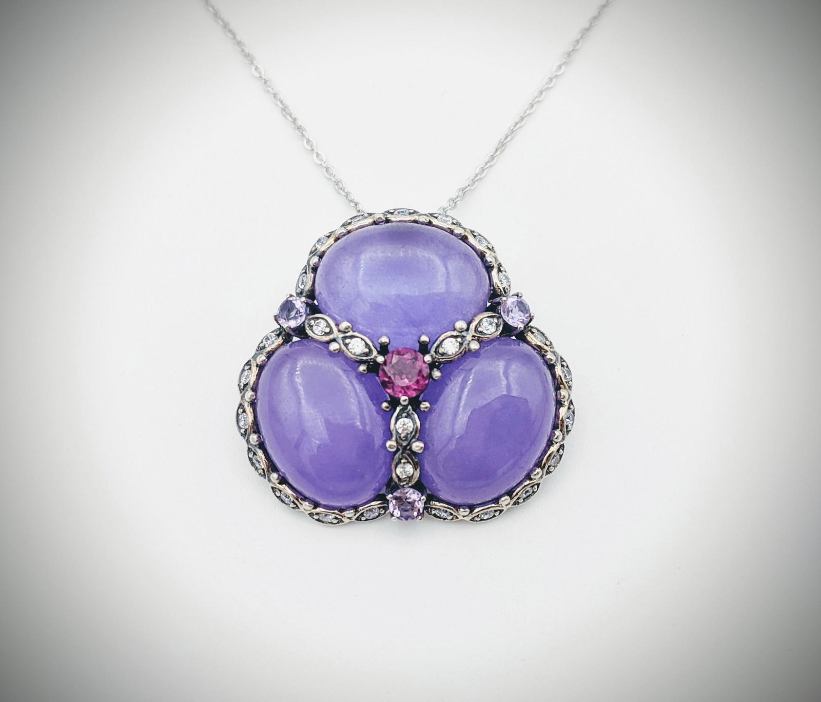 Chalcedony, Amethyst, Pink Sapphire & CZ Pendant-Brooch: Title: Chalcedony, Amethyst, Pink Sapphire & CZ Pendant-Brooch w Sterling Silver Necklace Brand: Jean Lin Collection Metal Purity: 925 Sterling Silver Gemstones: Chalcedony, Amethyst, Pink Sapphire &