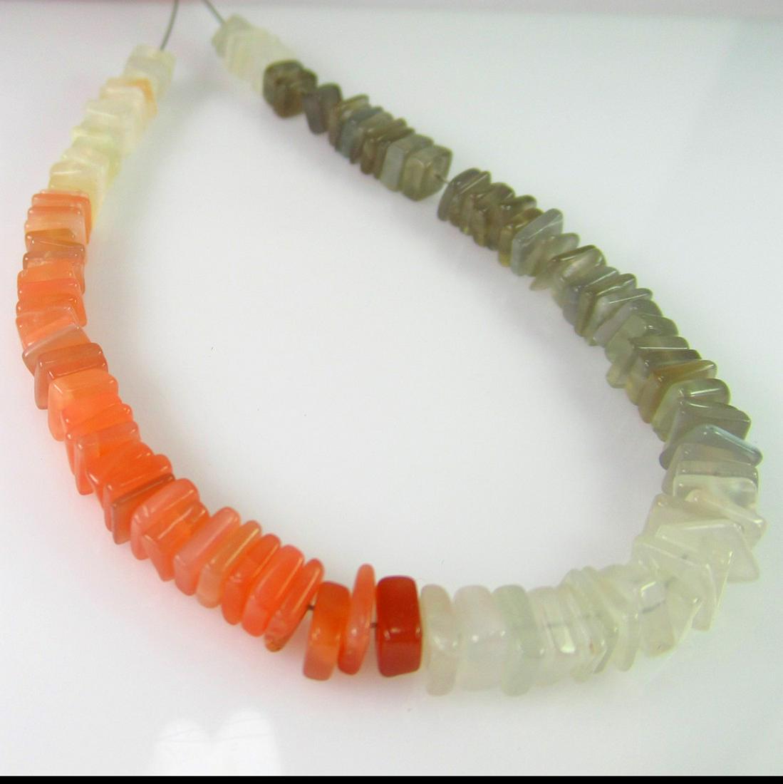 36.94 Ct Genuine 104 Drilled Moonstone Square Beads: No Reserve! Title: 36.94 Ct Genuine 104 Drilled Moonstone Square Beads Stone Clarity: Semi-Transparent Gemstones: Natural Moonstone Beads Carat Weights: 36.94 Size/Dimensions: 4.5x1.6 - 4.8x2.1 mm / 1