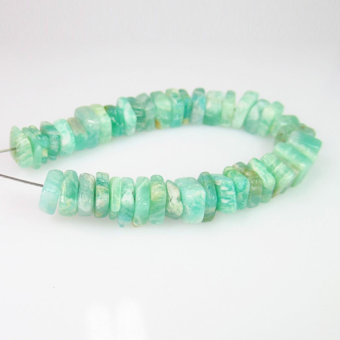 30.36 Ct Genuine 44 Drilled Amazonite Square Flat Beads: No Reserve! Title: 30.36 Ct Genuine 44 Drilled Amazonite Square Flat Beads Stone Clarity: Translucent Gemstones: Natural Amazonite Beads Carat Weights: 30.36 Size/Dimensions: 5.2x5.2 - 6.3x6.3 mm / 44