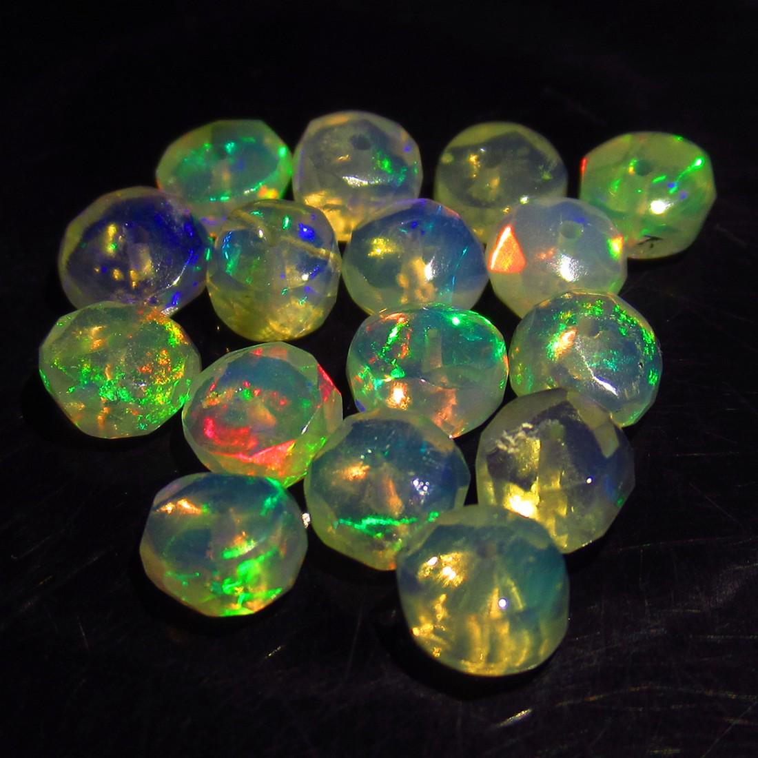 5.40 Ct Genuine 16 Drilled Round Faceted Opal Beads: No Reserve! Title: 5.40 Ct Genuine 16 Drilled Round Faceted Opal Beads Stone Clarity: Transparent Gemstones: Natural Faceted Opal Beads Carat Weights: 5.40 Size/Dimensions: 4.60 to 5.1mm / 16 PC's Add