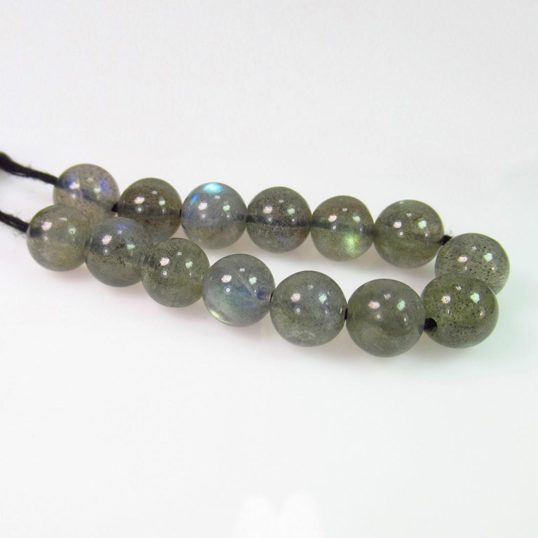 42.83 Ct Genuine 14 Labradorite Drilled Ball Beads: No Reserve! Title: 42.83 Ct Genuine 14 Labradorite Drilled Ball Beads Stone Clarity: Transparent Gemstones: Natural Labradorite Beads Carat Weights: 42.83 Size/Dimensions: 7.50 - 8.10 mm / 14 PC's Add
