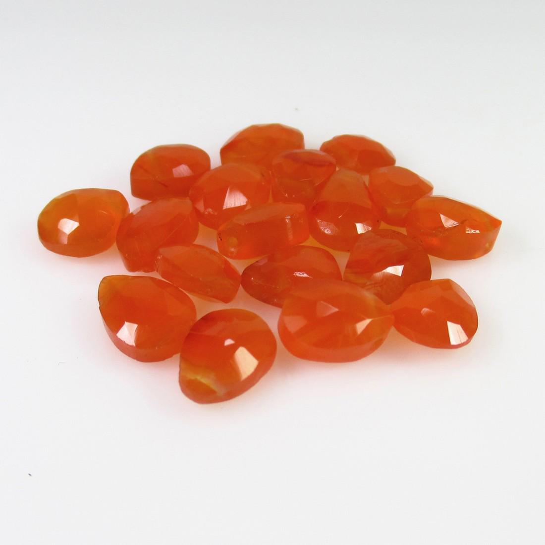 22.27 Ct Genuine 18 Orange Carnelian Drilled Pear Beads: No Reserve! Title: 22.27 Ct Genuine 18 Orange Carnelian Drilled Pear Beads Stone Clarity: Transparent Gemstones: Natural Carnelian Beads Carat Weights: 22.27 Size/Dimensions: 7.6x5.6 - 9.3x6.5 mm / 18