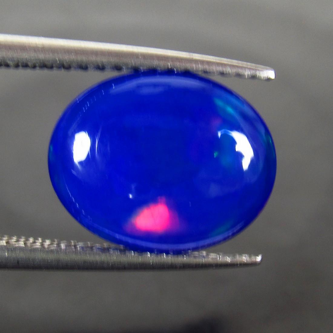 2.36 Ct Genuine Ethiopian Blue Fire Opal Oval Cab (1 of 2)
