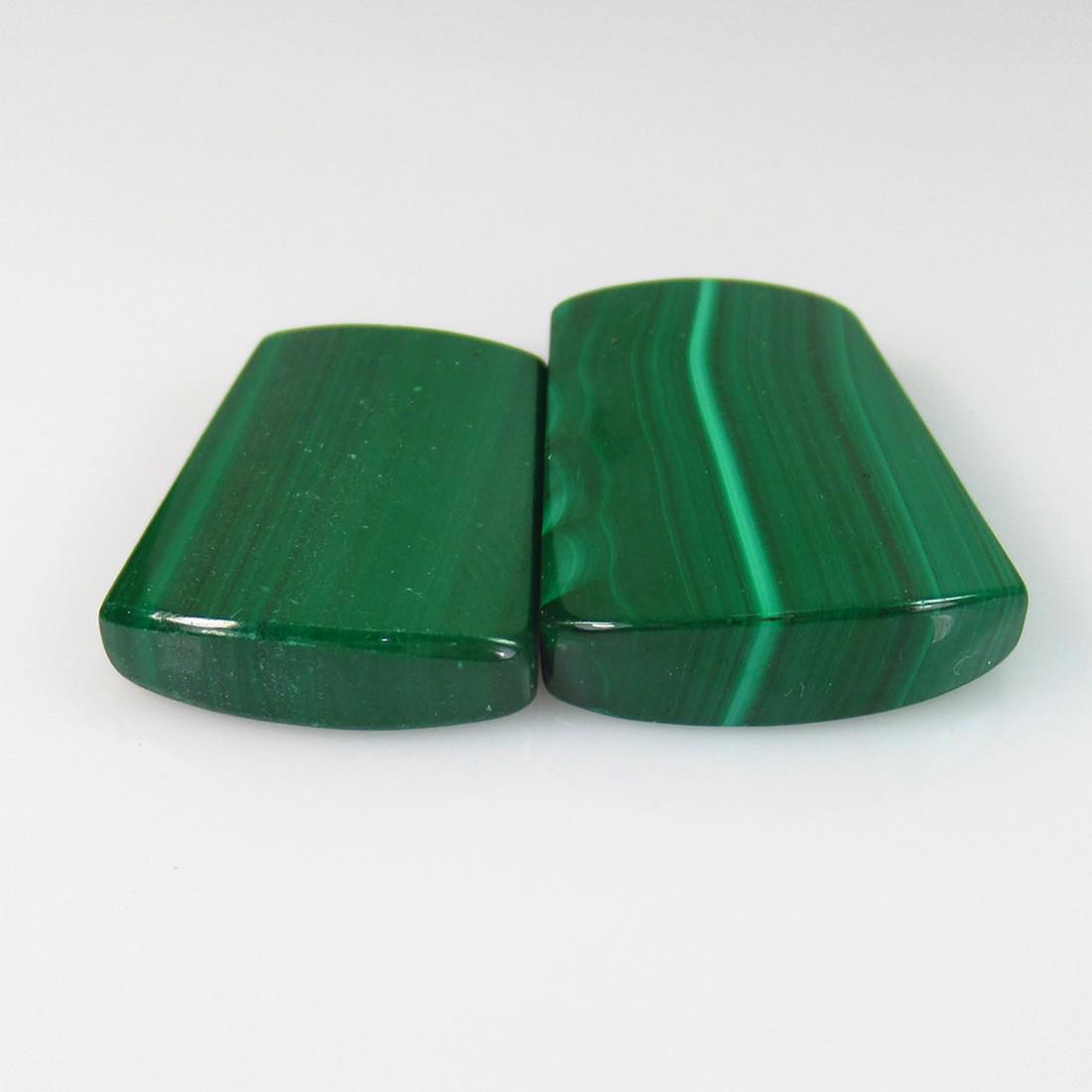 46.79 Ct Genuine Green Malachite Drilled Fancy Cut Pair: No Reserve! Title: 46.79 Ct Genuine Green Malachite Drilled Fancy Cut Pair Stone Clarity: Opaque Gemstones: Natural Malachite Carat Weights: 46.79 Size/Dimensions: 19.9x14.4 - 22.0x15.7 mm / 2 PC's Ad