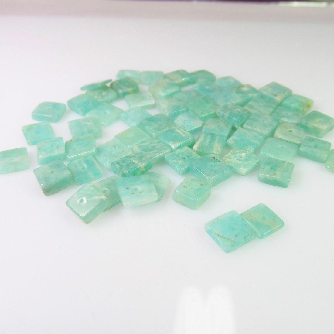31.41 Ct Genuine 59 Drilled Amazonite Square Flat Beads: No Reserve! Title: 31.41 Ct Genuine 59 Drilled Amazonite Square Flat Beads Stone Clarity: Transparent Gemstones: Natural Amazonite Beads Carat Weights: 31.41 Size/Dimensions: 5.2x2.1 to 5.8x1.1 mm / 5
