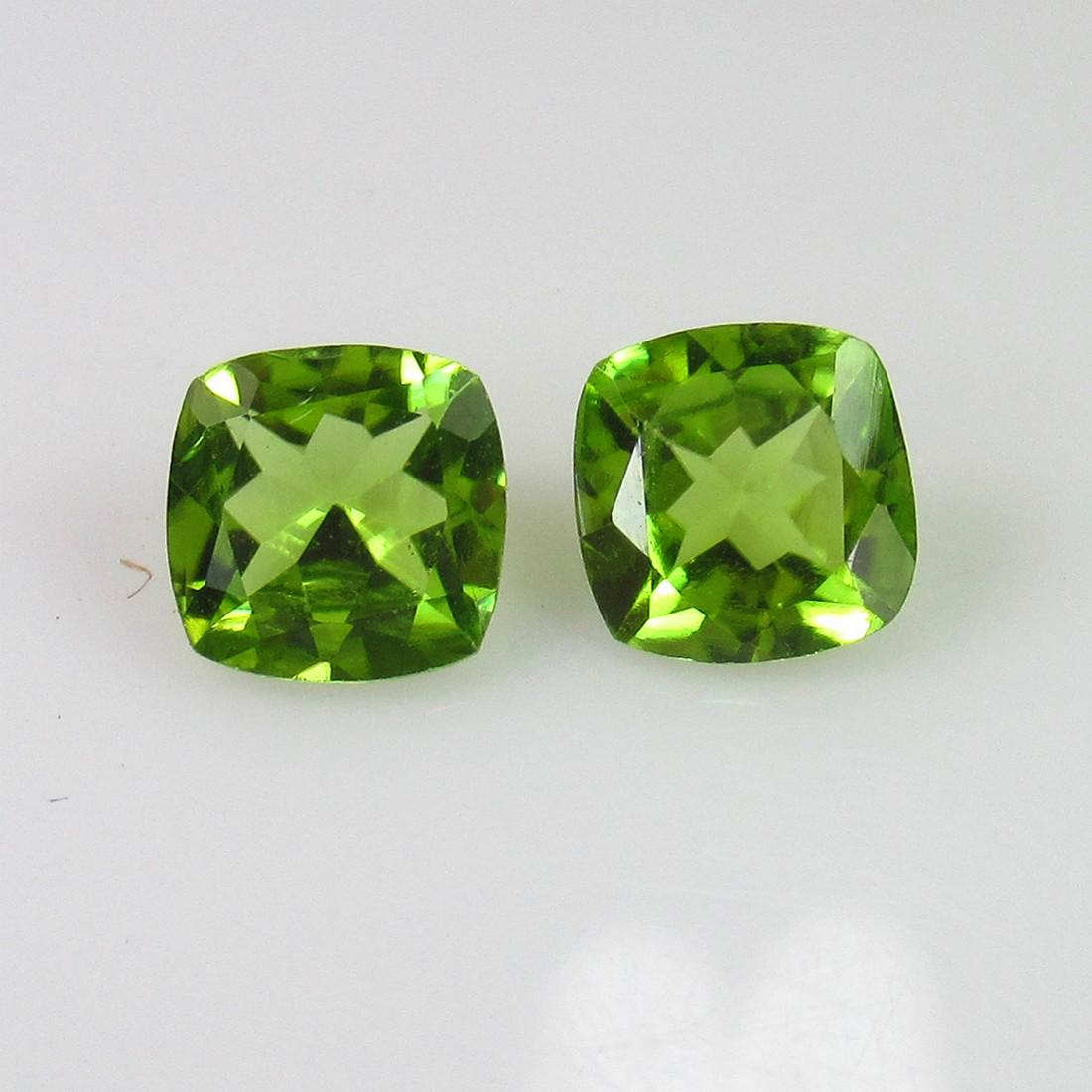 2.61 Ct Genuine Pakistan Peridot Cushion Pair: No Reserve! Title: 2.61 Ct Genuine Pakistan Peridot Cushion Pair Stone Clarity: VVS Gemstones: Natural Peridot Carat Weights: 2.61 Size/Dimensions: 7.20 x 7.20 x 4.00 mm / 2 PC's Additional Informatio