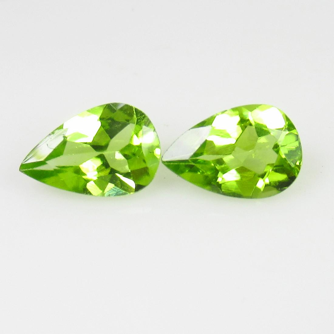 2.31 Ctw Natural Pakistan Peridot Pear Pair: No Reserve! Title: 2.31 Ctw Natural Pakistan Peridot Pear Pair Stone Clarity: VVS Gemstones: Peridot Carat Weights: 2.31 Size/Dimensions: 7.80 x 5.90 x 3.90 mm / 2 PC's Additional Information: Top Cla