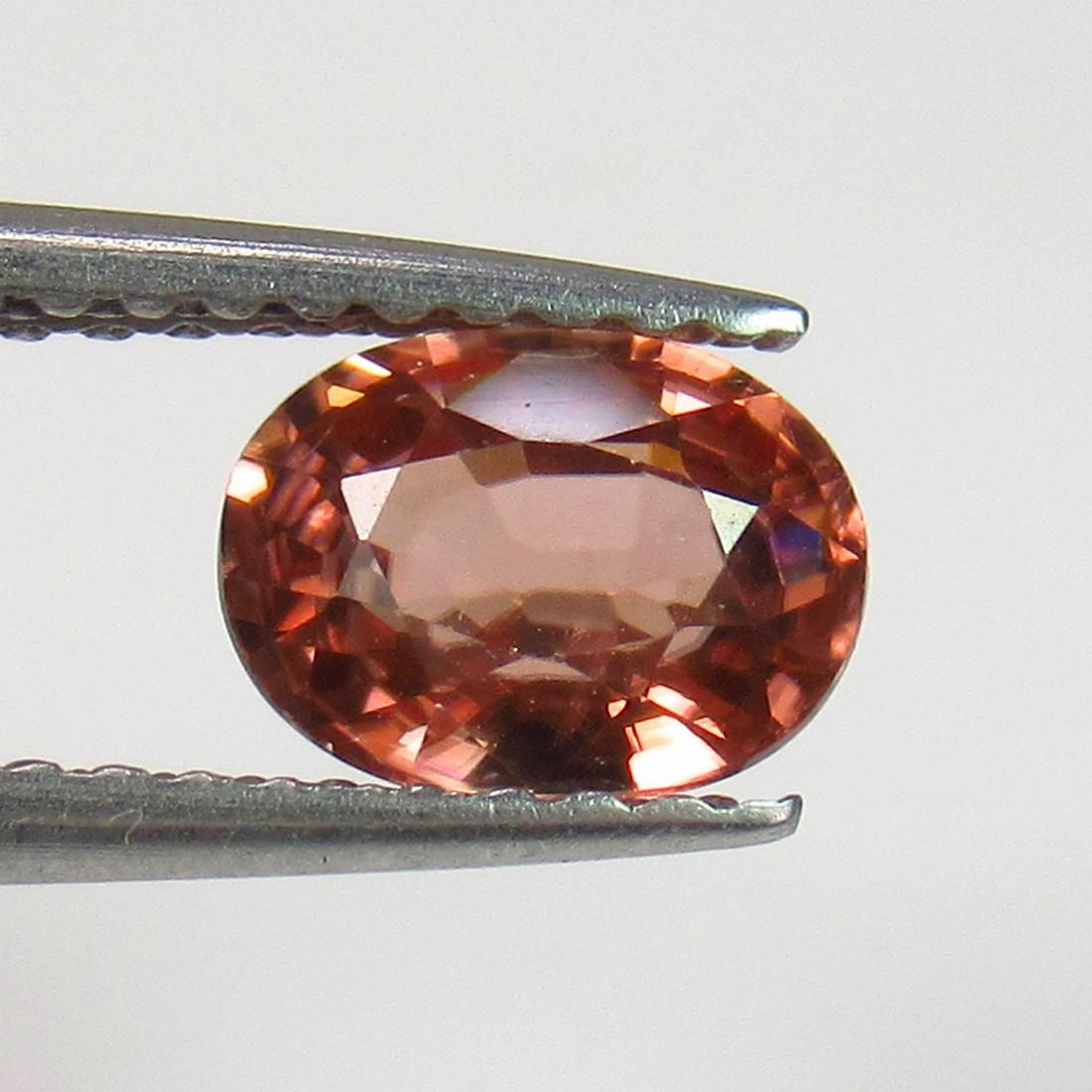 1.10 Ctw Natural Pnk Zircon Oval Cut: No Reserve! Title: 1.10 Ctw Natural Pnk Zircon Oval Cut Stone Clarity: VVS Gemstones: Zircon Carat Weights: 1.10 Size/Dimensions: 6.70 x 4.90 x 3.20 mm Additional Information: Top Luster / Excellent O