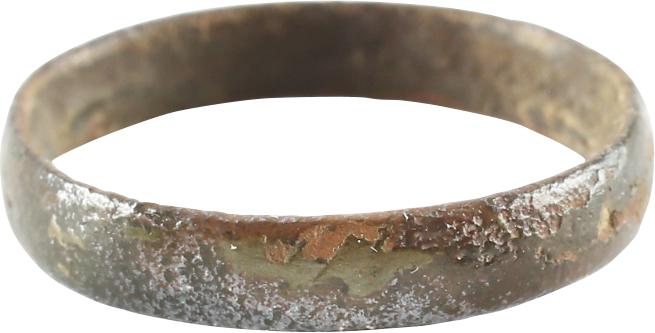 VIKING WOMAN’S WEDDING RING, 850-1050 AD SIZE 6 ¼: No Reserve! S6 1/4. Bronze originally gilt, size 6 1/4. Rounded section. Made by casting with a central core to distribute the molten copper, which was then laboriously removed. Originally gilt, thi