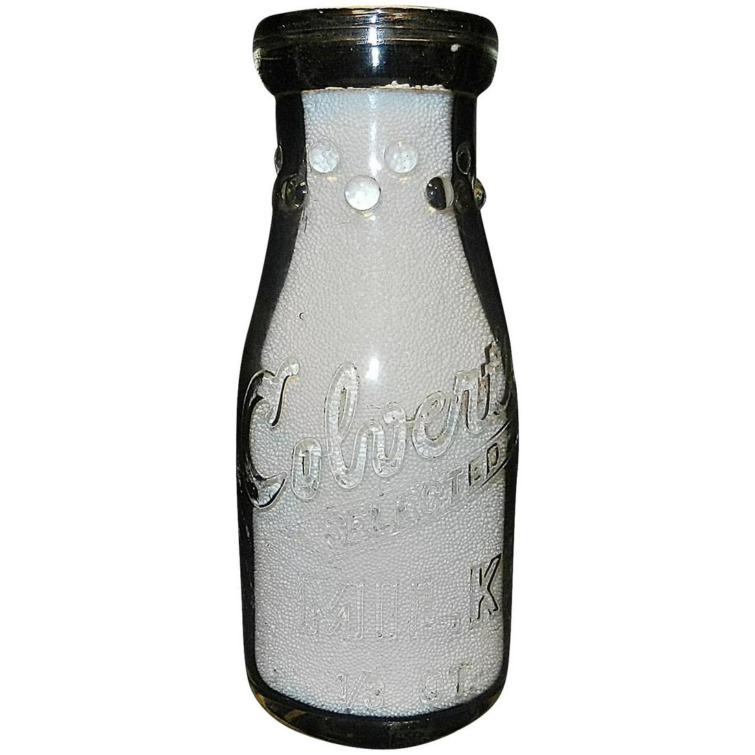 Vintage Colvert: This Vintage Colvert's 1/3 Quart Medallion Milk Bottle is in very good to excellent condition- does have a few use marks shown in photos. The 1/3 qt is smaller than a pint. Clear no stains. I attempt 