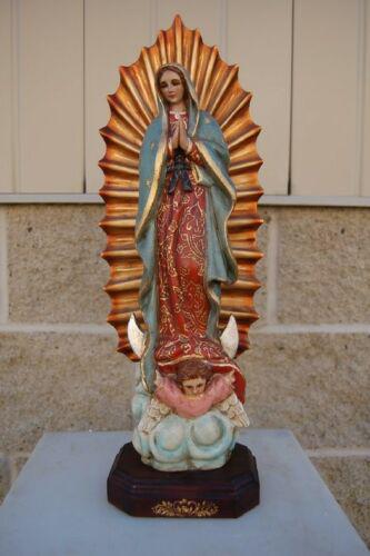Fine Hand Carved Wood Statue of Mary "Our Lady: Fine Hand Carved Wood Statue of Mary "Our Lady Guadalupe" 17" chalice co. This is a very fine hand carved wood statue of "Our Lady of Guadalupe" as shown It stands 17" tall All hand carved in w