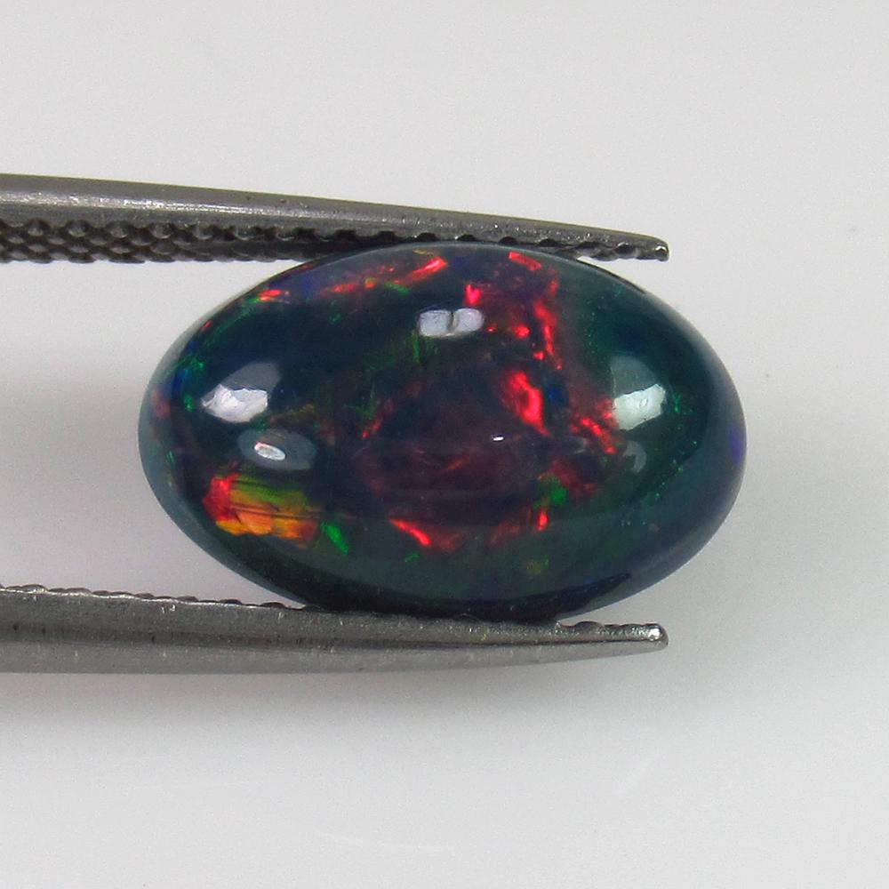 1.91 Ct Genuine Ethiopian Fire Black Opal Oval Cab (1 of 2)