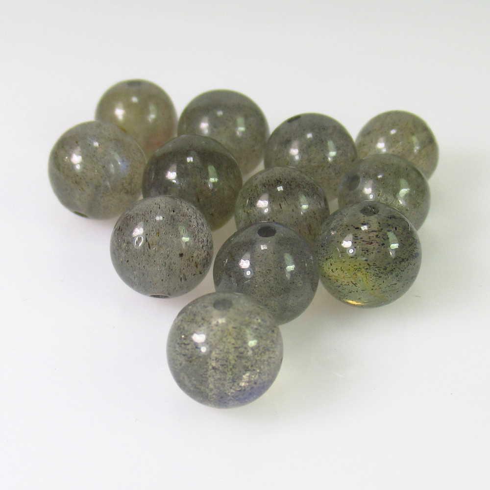 45.35 Ct Genuine 12 Labradorite Drilled Round Beads: No Reserve! Title: 45.35 Ct Genuine 12 Labradorite Drilled Round Beads Stone Clarity: Transparent Gemstones: Natural Labradorite Beads Carat Weights: 45.35 Size/Dimensions: 8.00 - 8.70 mm / 12 PC's Ad