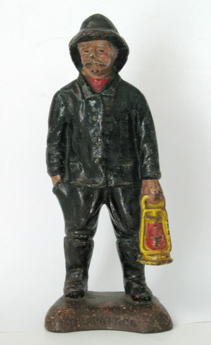 The Patrol cast iron doorstop.: Title: The Patrol cast iron doorstop. Date/Period: Early 1900's Dimension: 9” tall Provenance:Nice vintage New England cast iron doorstop marked “The Patrol”. It depicts an elderly gent wearing 