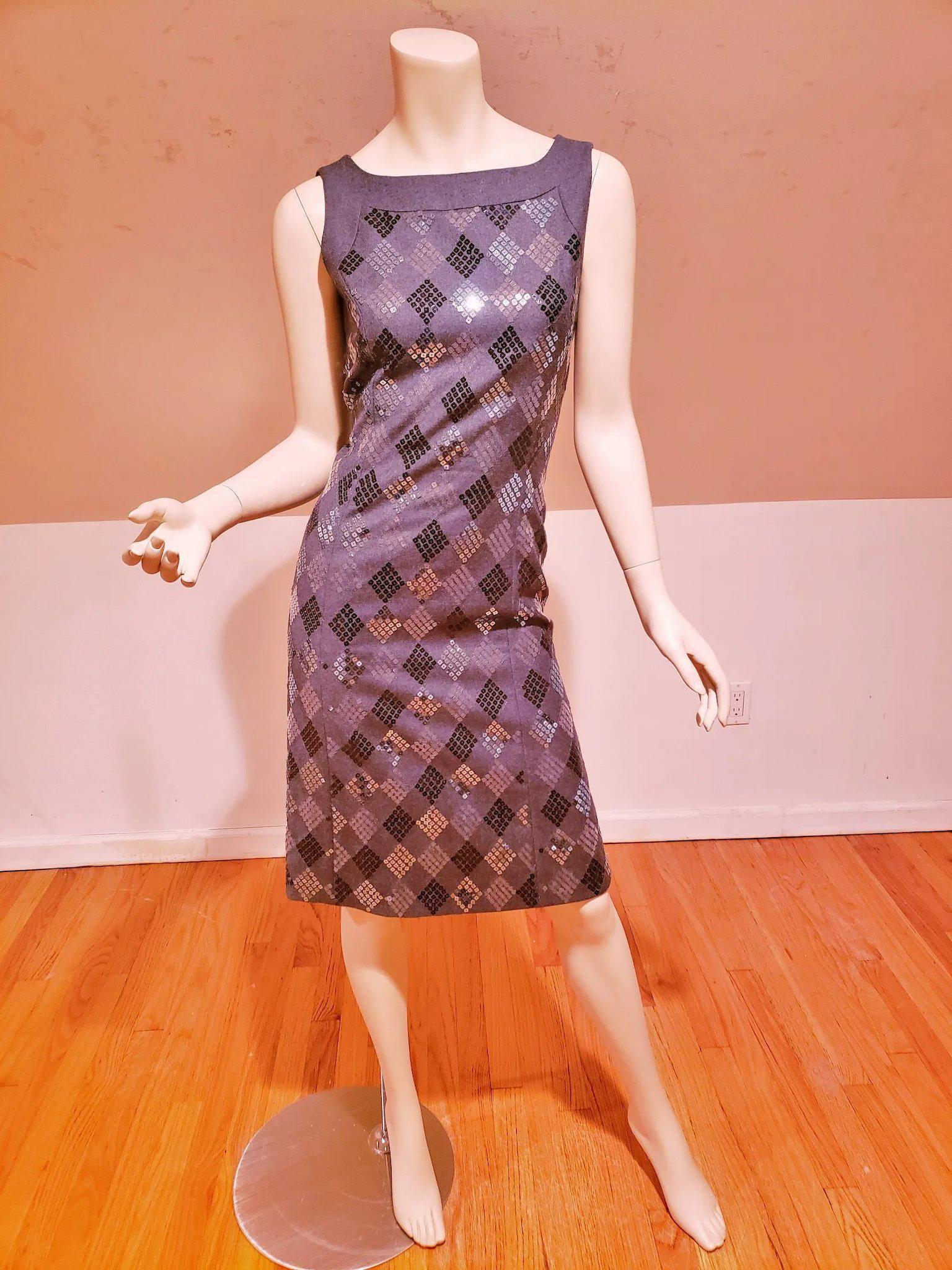 Vtg Givenchy Boutiques grey Payette Sheath dress: Stunning rare Givenchy Boutiques Demi Couture Grey Sheath dress with square Payettes in Metallic grey and sheer Wool/Silk blend. Gorgeous classic style. In very good vintage condition. Fully Lined han
