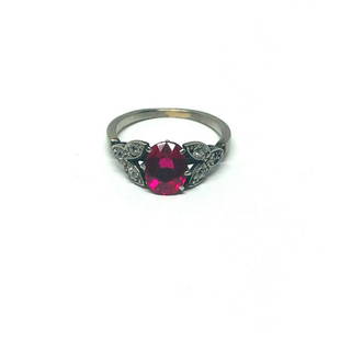 1950’s Platinum Ruby Rose Cut Diamond Ring Flower: KG ET0 1950’s Platinum Ruby Rose Cut Diamond Ring Material: Platinum Gemstone: Synthetic Ruby, Oval shape, approx. 1ct Gemstone2: Rose Cut Diamond approx. 0.18ct., J-K color Measurements: