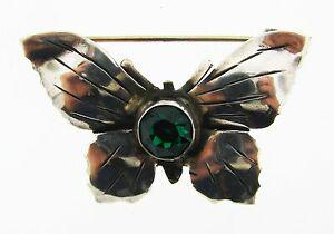 WHIMSICAL Hobe Sterling Silver & Green Stone Butterfly: DK Hobe Sterling Silver & Green Stone Butterfly Pin! This wonderful item is one of a kind! The weight is 5.1 grams. The height is 1 1/8 inches. The length is 1 ¾ inches. The width is 3/8 of an