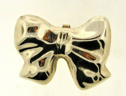 CUTE Mexican Silver Bow Pin!: DK Mexican Silver Bow Pin! This wonderful pin is one of a kind! The weight is 21.7 grams. The height is 2 inches. The length is 2 3/8 inches. The width is ¼ of an inch. This fantastic piece is