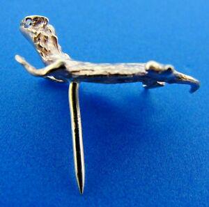 IN THE WILD 14k Yellow Gold & Diamond Lizard Tie Pin: DK 14k Yellow Gold & Diamond Lizard Tie Pin · This is a must for any collector. · The weight is 2.8 grams. There are 0.02 points of diamonds. The length is 7/8 of an inch. The width is ¼ of an